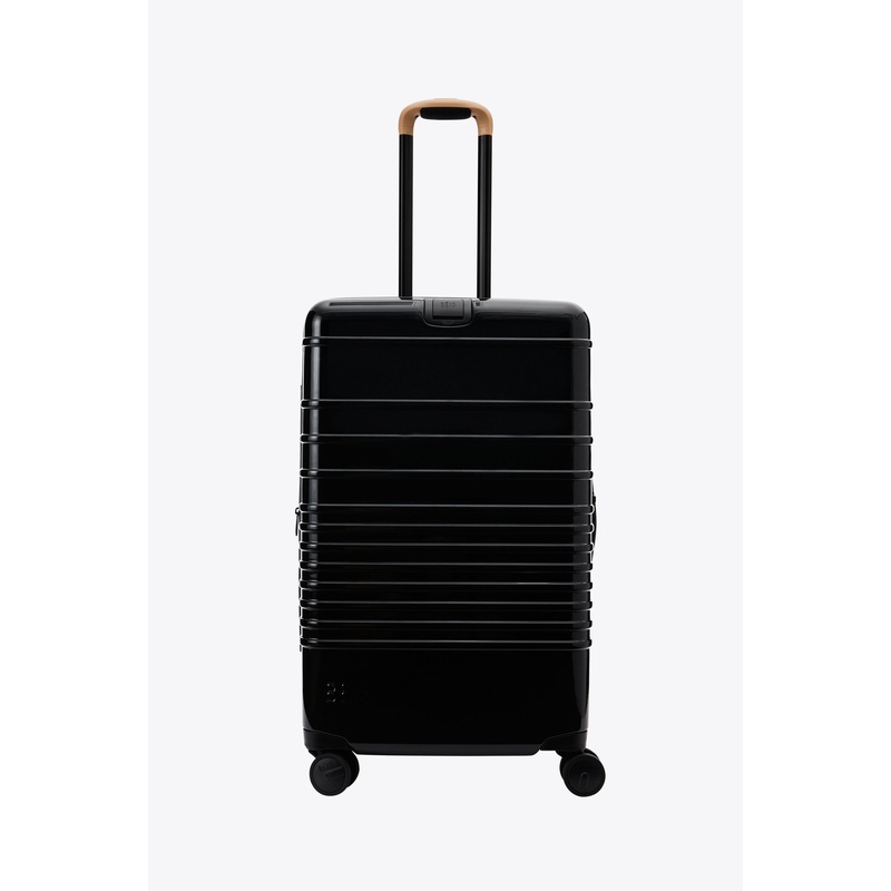 Resale The Medium Check-In Roller in Glossy Black