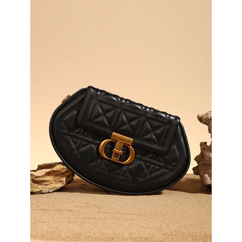 The Quilted Curve Sling Bag - Midnight Black