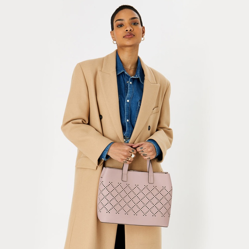 Accessorize London women's Faux Leather Nude Cut Out Handheld Sling bag